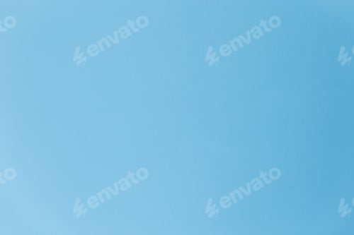 Preview: Blank blue sheet of paper texture. Light blue background