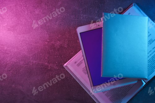 Preview: Books with a tablet and a keyboard, on a light background.