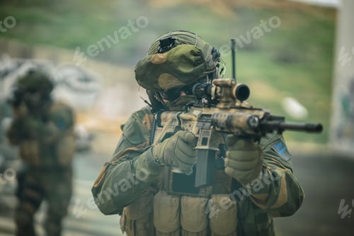 Preview: Shallow focus of a group of special force soldiers investigating an abandoned area