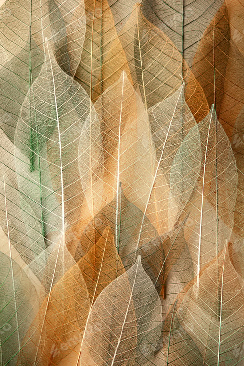 Preview: Background from artificial autumn leaves, closeup