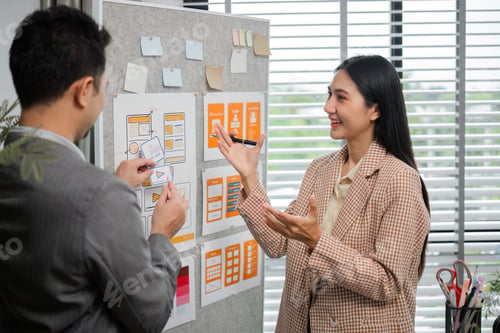 Preview: Creative Team of Graphic Designers Collaborating on Innovative Projects in Modern Office Environment