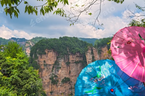 Preview: Women with umbrellas on the Heaven Pillar viewpoint
