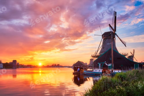 Preview: Windmills at Zaanse Schans in Holland on sunset. Zaandam, Nether