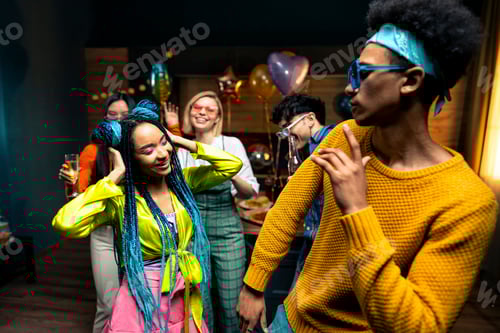 Preview: Group of friends making party at home on new year evening