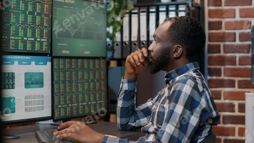 Preview: Male investor brainstorming ideas to create stock trading profit