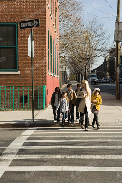 Preview: Teacher and pupils crossing road
