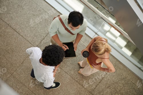 Preview: Coworkers Gathered to Discuss Infographics