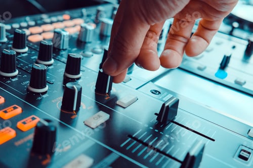 Preview: image of Dj playing music at mixer closeup