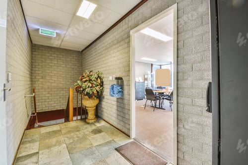 Preview: Doorway of modern apartment with white walls and parquet floor