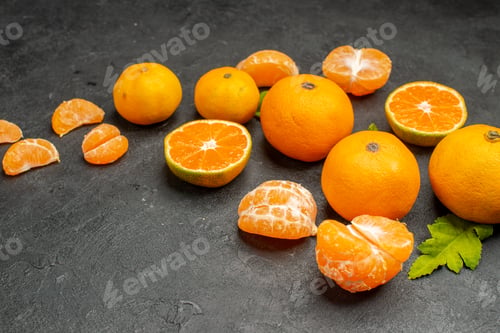 Preview: front view tasty juicy tangerines on a dark background exotic citrus orange color photo sour fruit