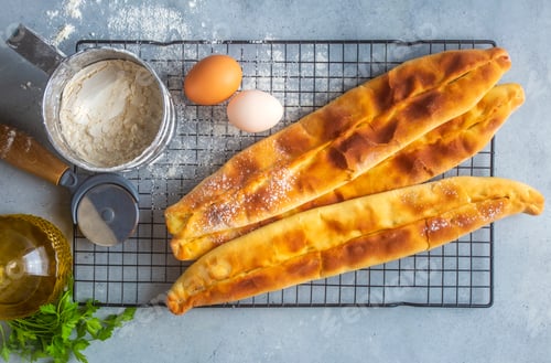 Preview: Turkish cuisine, handmade pita with cheddar cheese, pastry. Turkish name; kasarli pide