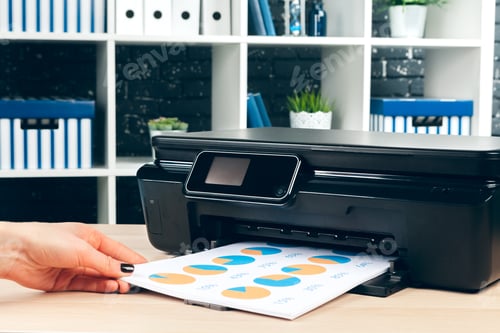Preview: Female secretary making photocopies on xerox machine in office