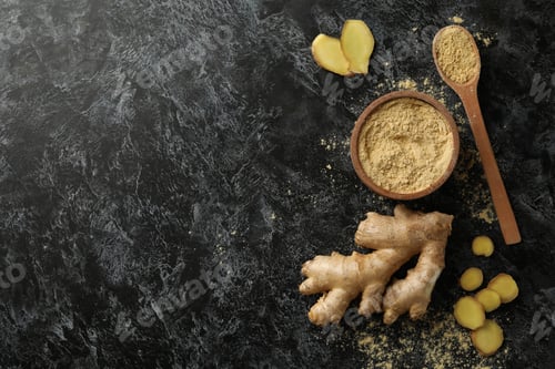 Preview: Ginger and bowl with ginger powder on black smoky background