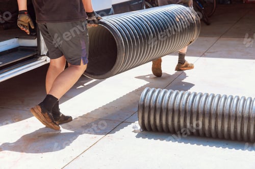 Preview: Flow of rainwater to a main collector is provided by installation of plastic black pipes