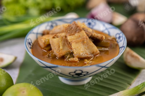 Preview: Red curry with pork belly and put morning glory in a ceramic cup.
