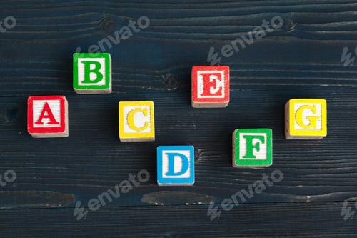 Preview: Alphabet blocks ABC on wooden table