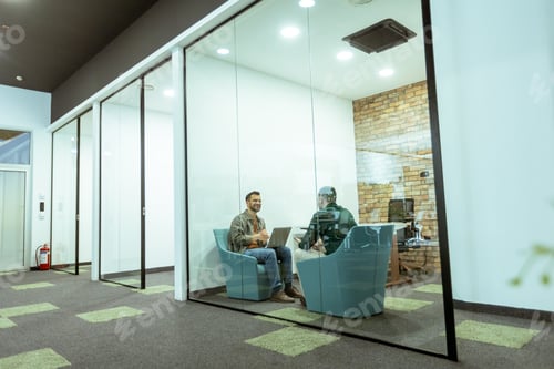 Preview: Casual Business Meeting in a Modern Office Lounge
