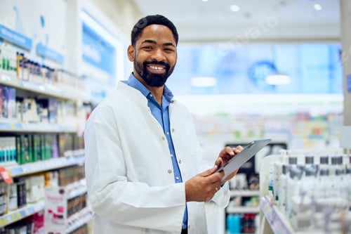 Preview: Friendly Pharmacist Consulting in a Modern Pharmacy With Shelves of Products