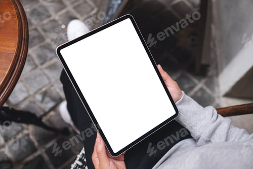 Preview: Top view mockup image of a woman holding digital tablet with blank white desktop screen