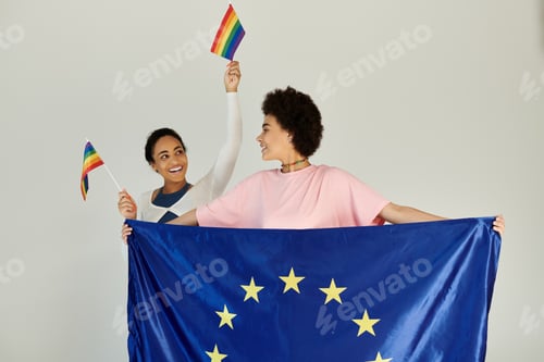 Preview: Celebrating unity and pride with flags in a vibrant indoor setting capturing joy and diversity