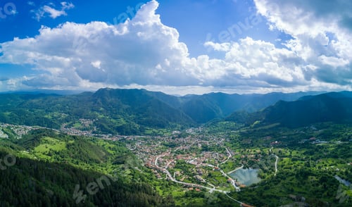 Preview: Bulgarian town Smolyan with lake, vegetation and clouds. Rhodope Mountains. Panorama, top view
