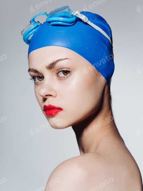 Preview: Beautiful woman red lip blue swimming cap diving model