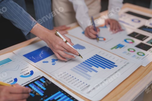 Preview: Team Reviewing Business Data in an Office