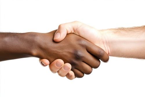Preview: Hands coming together in a handshake symbolizing unity and collaboration between diverse individuals