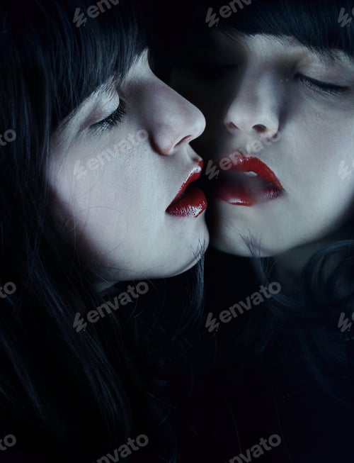 Preview: Brunette woman reflected in a mirror