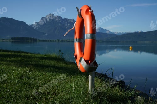 Preview: Lifebuoy hanging next to a sea