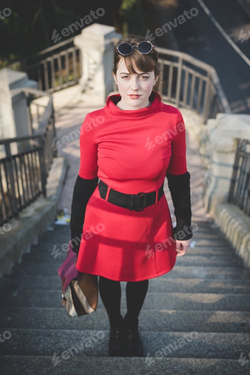 Preview: young beautiful red dressed vintage hipster woman