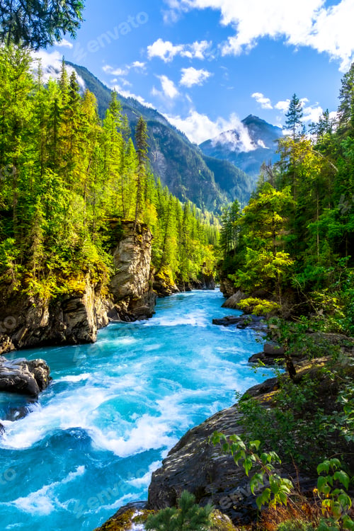 Preview: Turquoise water flowing through mount robson provincial park