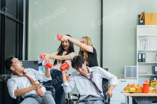 Preview: Celebration successful deal and pizza in the workplace.