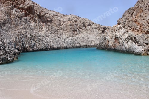 Preview: turquoise sea and white sand against the background of rocks, seascape