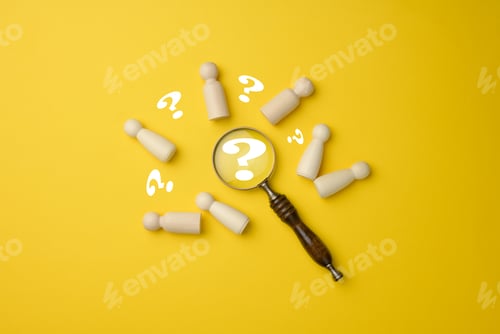 Preview: Wooden men and a magnifying glass on a yellow background.