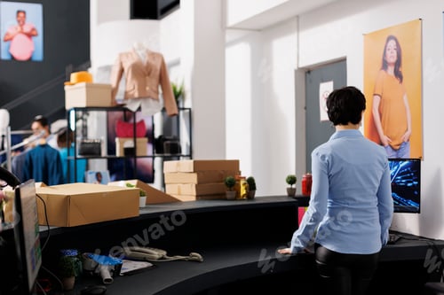 Preview: Formal worker standing at counter desk