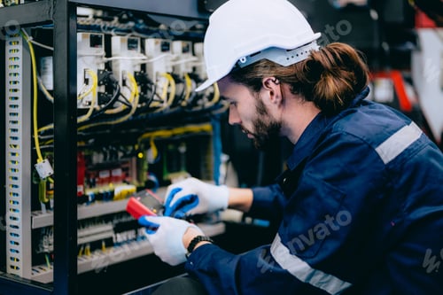 Preview: Professional technician checking and repairing part of automatic machine