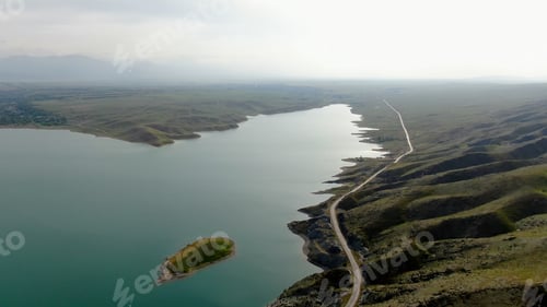 Preview: Aerial view of a reservoir with fresh water with the mountain