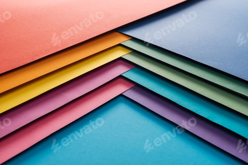 Preview: blue, orange, green, burgundy, yellow, pink and purple sheets of paper on blue background