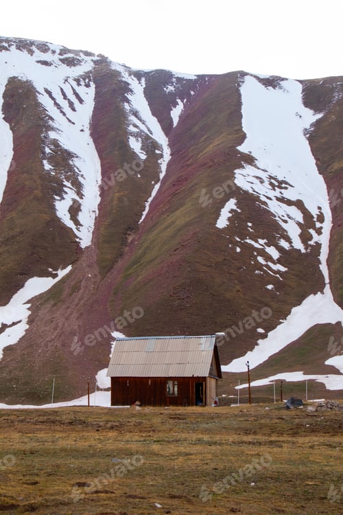 Preview: Small Cabin at Base of Red Mountain with Snow Strips