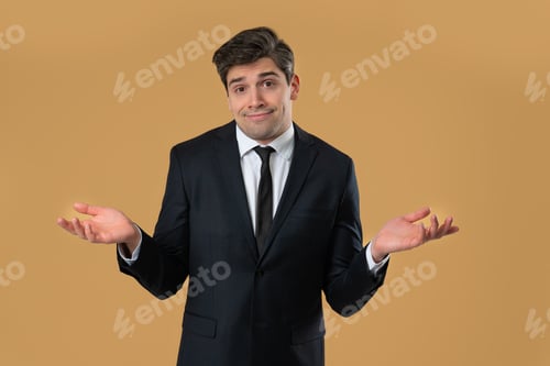 Preview: Man in Suit Shrugging Shoulders With Palms Upward