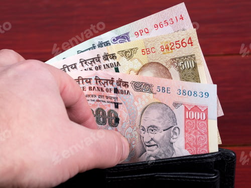 Preview: Old Indian money in the black wallet