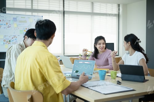 Preview: Shot of startup business team brainstorming and planning new project together in modern office.