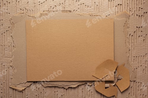 Preview: Recycle symbol on stack of recycled paper as background texture. Recycling idea concept