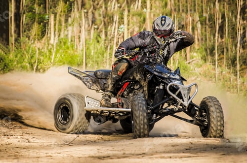 Preview: ATV racer takes a turn during a race.