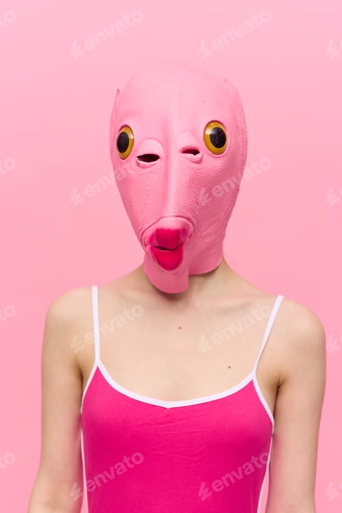 Preview: Modern Halloween costume in a silicone mask in the shape of a pink fish head in a sexy costume. The