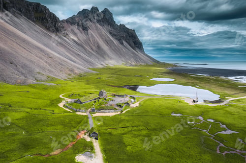 Preview: Abandoned icelandic viking village on wilderness near Vestrahorn mountain during summer