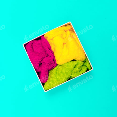 Preview: Multicolored napkins in a box. Minimal art