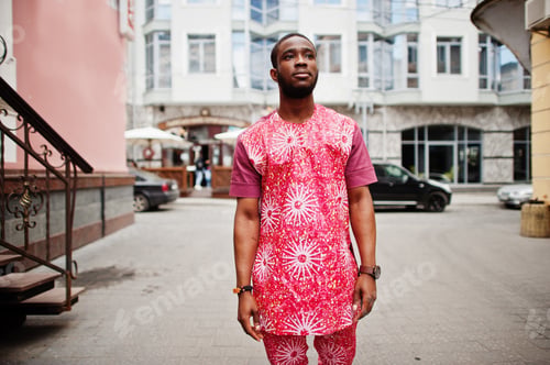 Preview: Black young man wearing african traditional clothes