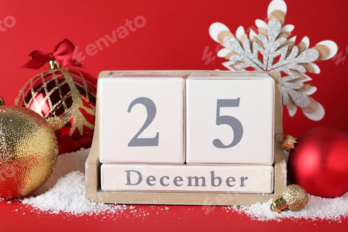 Preview: Block calendar and festive decor on red background. Christmas countdown